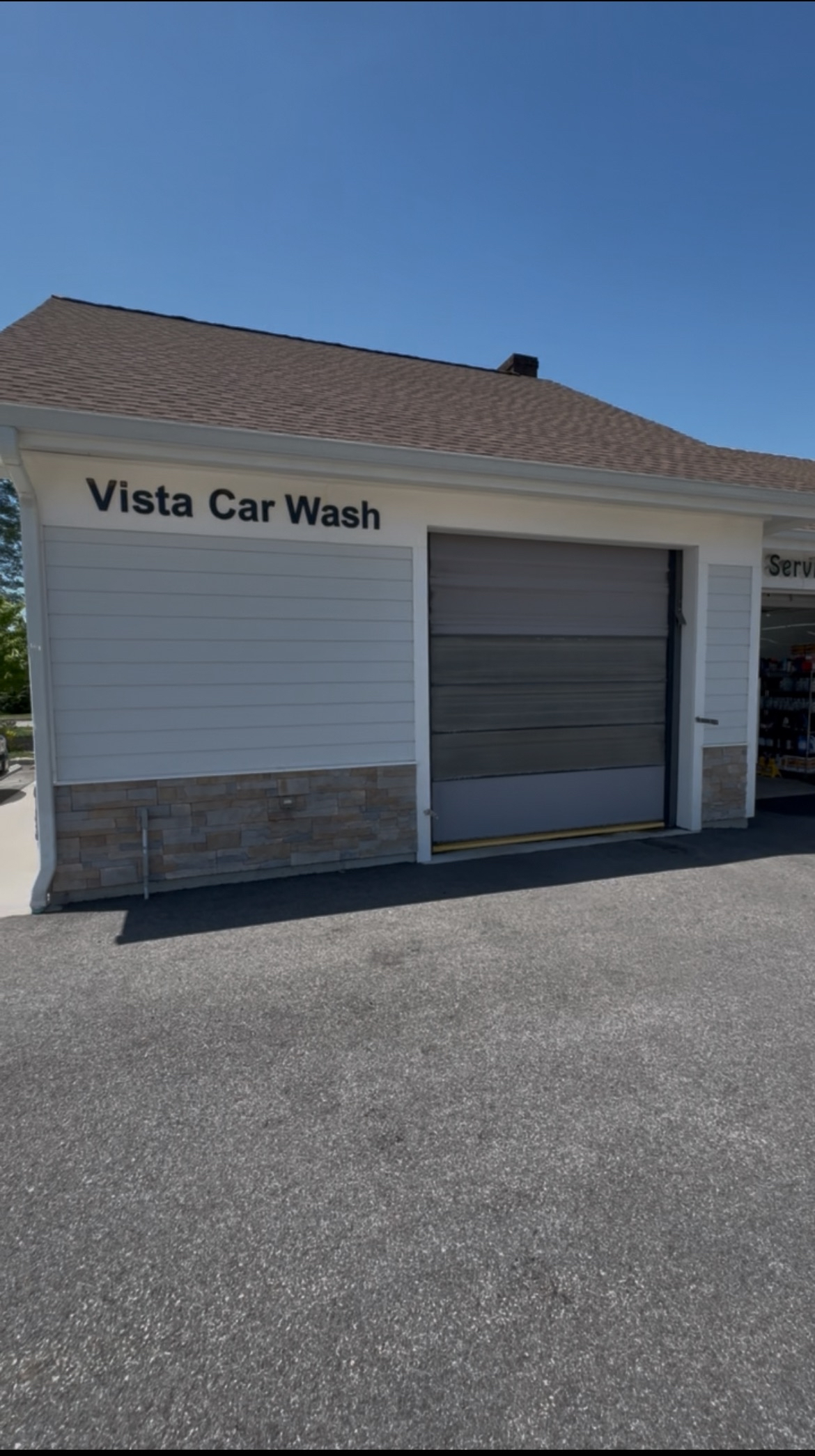 Vista Car Wash facility building with professional garage doors and signage in South Salem, NY